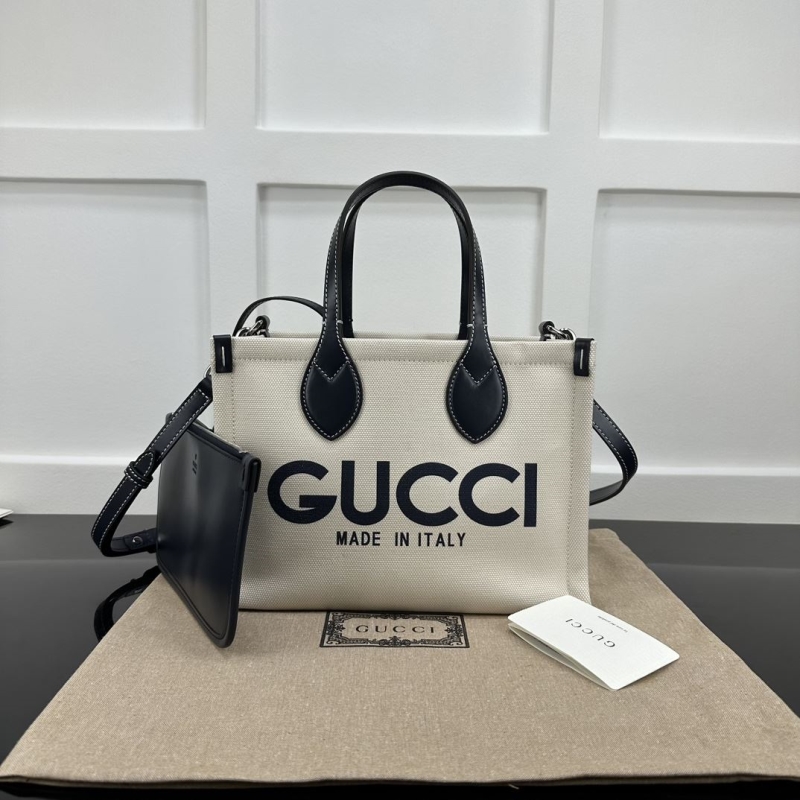 G*u*i shopping bags